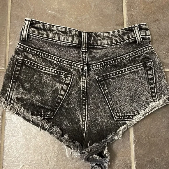 cheeky, black distressed jean shorts by Top Shop - Picture 2 of 7
